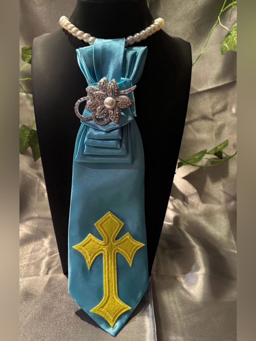 Women Light Blue Satin Neck Tie with Pearl Brooch and Yellow Cross Accent